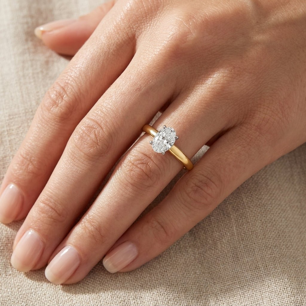 SOL-075O-0LD Oval solitaire engagement ring hand-model