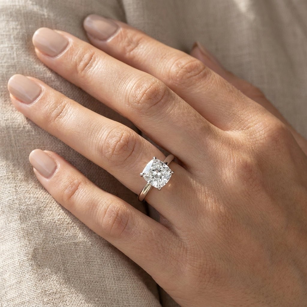 RM12844-100C-WLD Cushion solitaire engagement ring hand-model