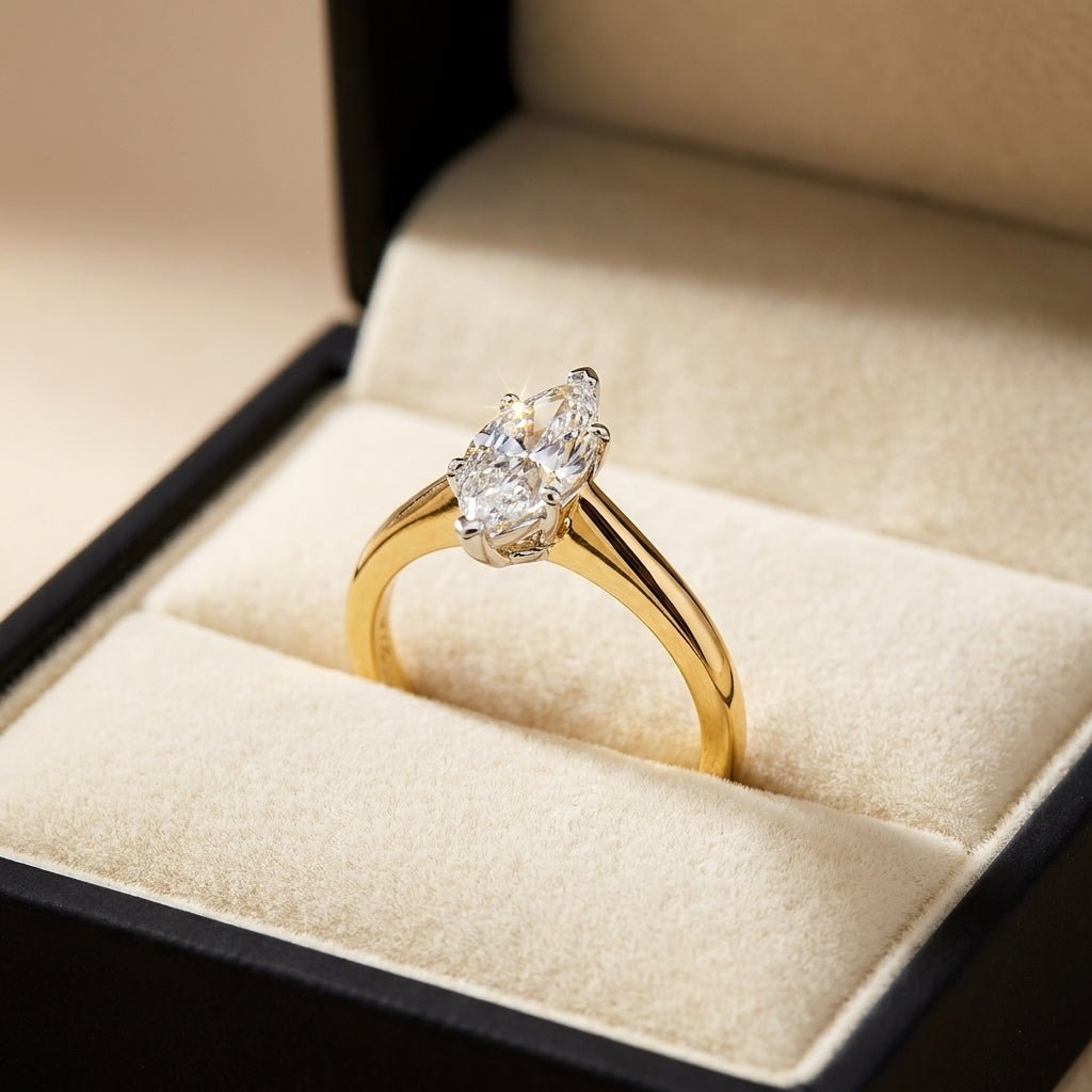 RM12602C-LD marquise engagement ring in presentation box