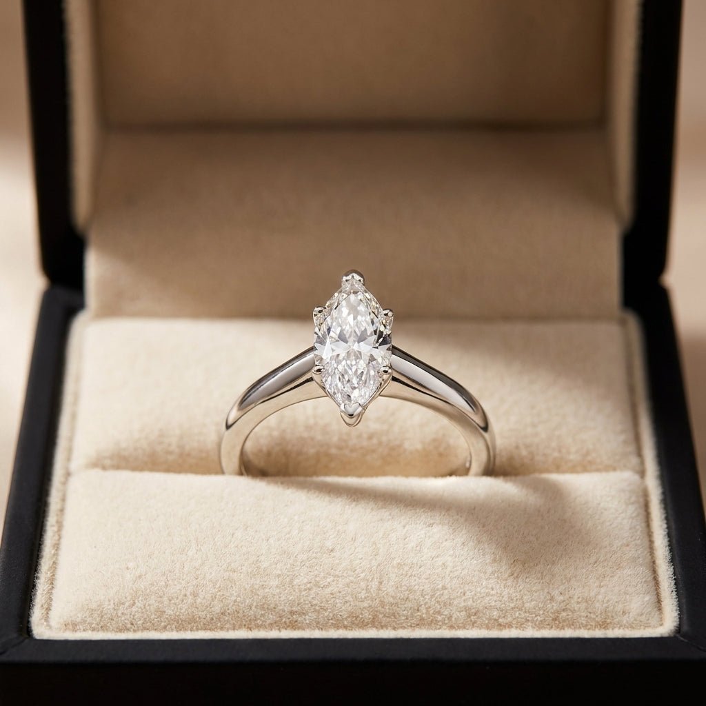 RM12602C-WLD marquise engagement ring in presentation box