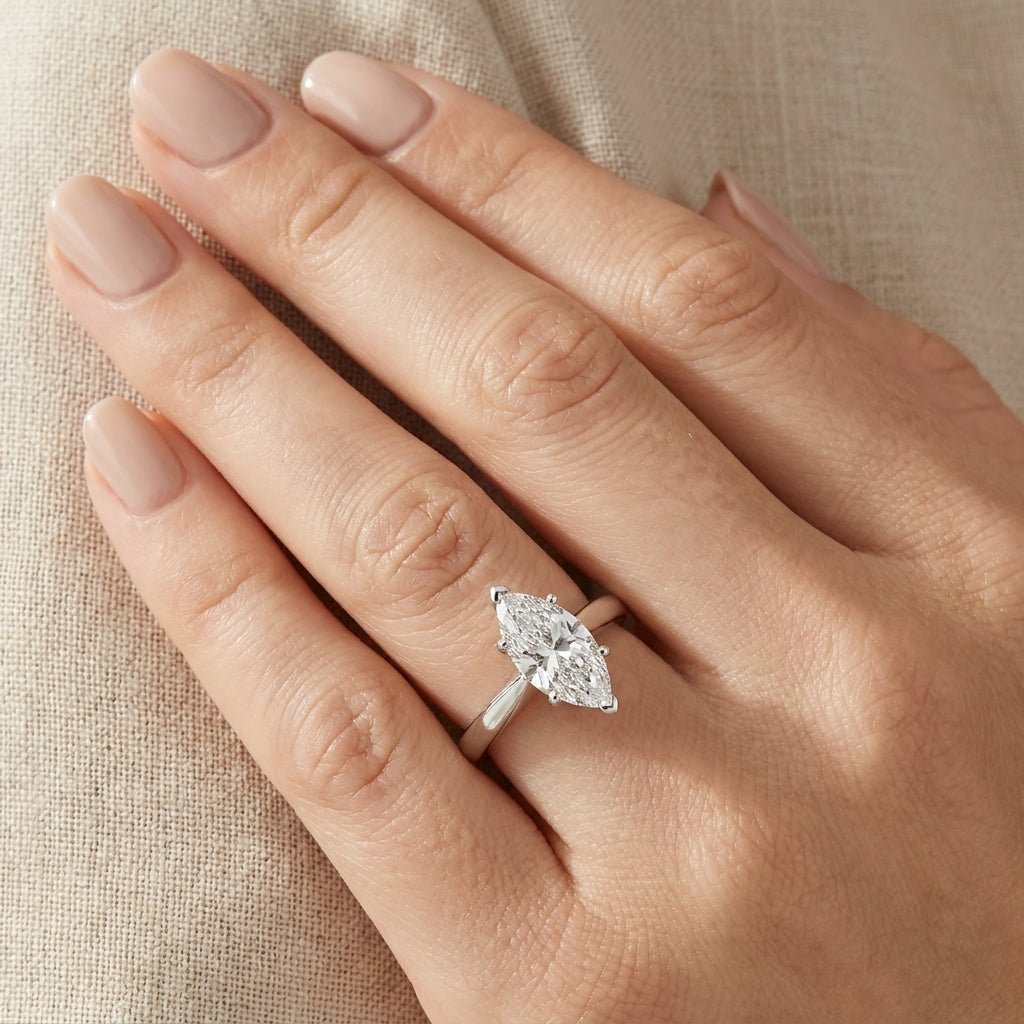 RM12602C-WLD Marquise solitaire engagement ring hand-model