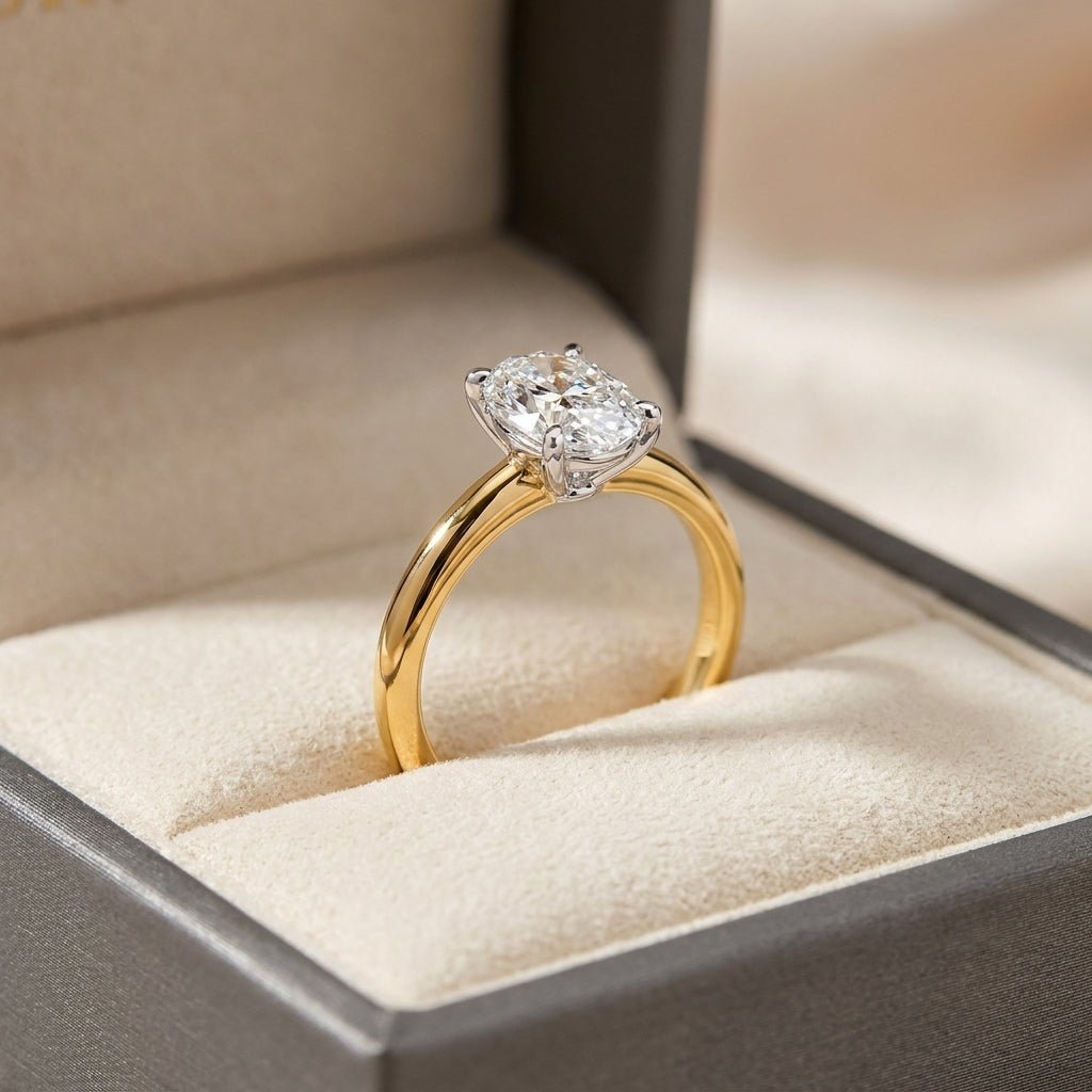 RM12599C-LD oval engagement ring in presentation box