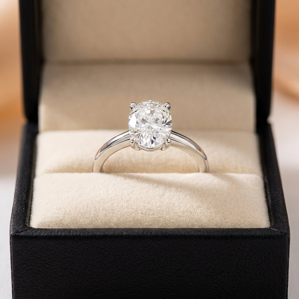 RM12599C-WLD oval engagement ring in presentation box