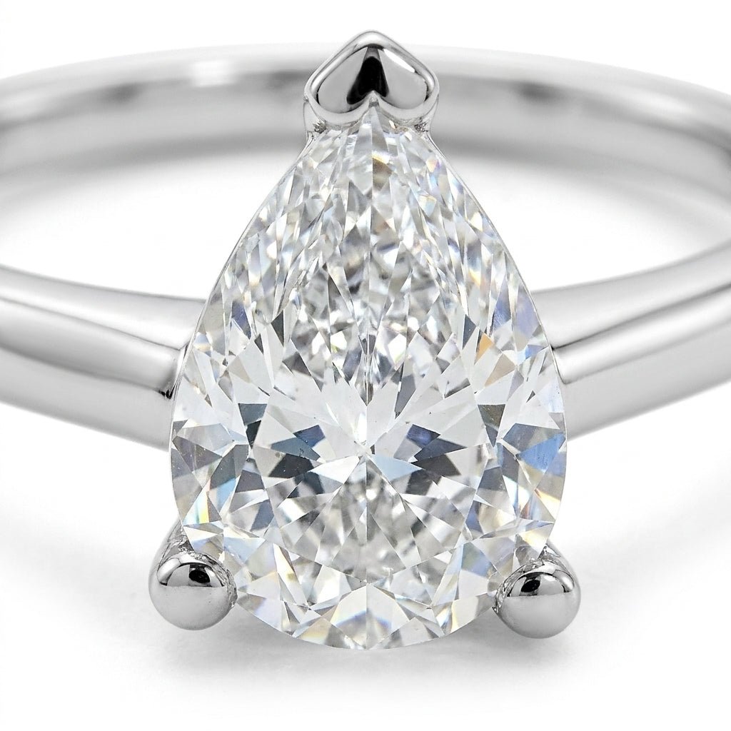 SOL-200PE-0WLD Pear solitaire engagement ring macro-sparkle