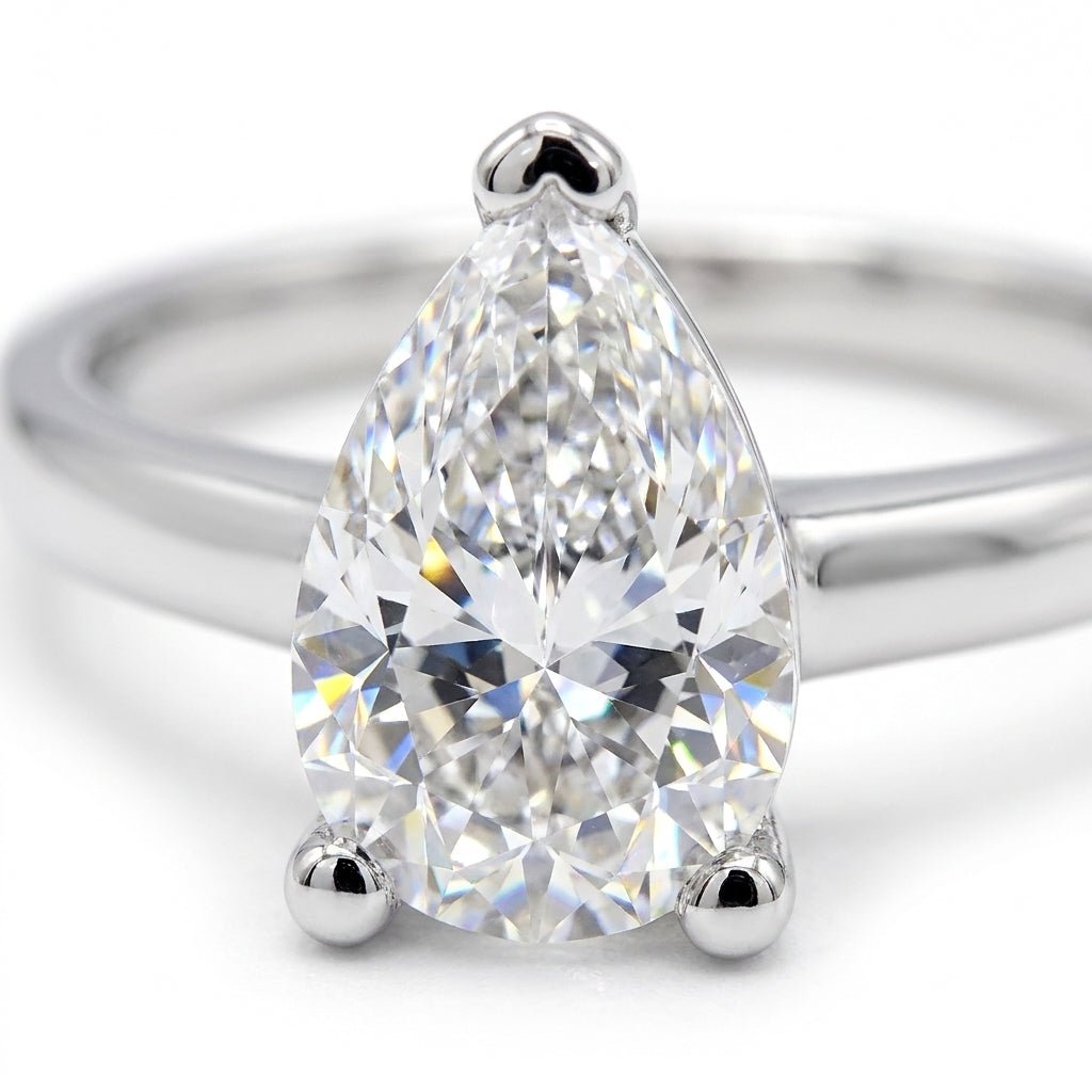 SOL-100PE-0WLD Pear solitaire engagement ring macro-sparkle
