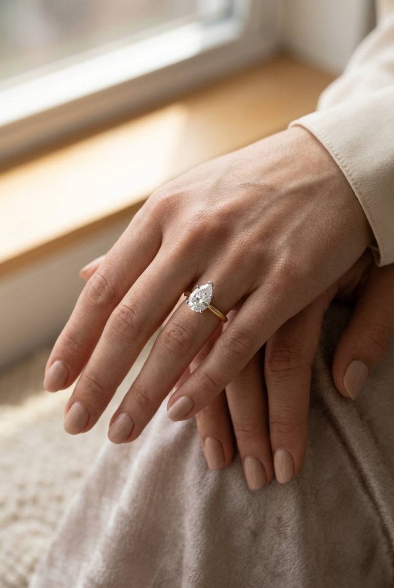 1 carat pear lab grown diamond engagement ring - full hand scale