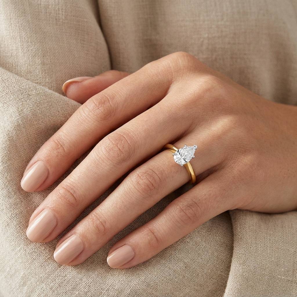 1 carat pear lab grown diamond engagement ring - hand model