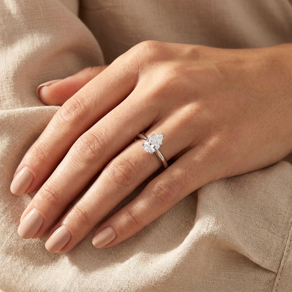 1 carat pear lab grown diamond engagement ring - hand model