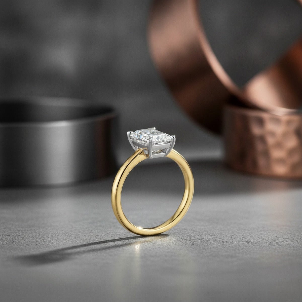 Aydins 1 Carat Radiant Lab Grown Diamond Engagement Ring | 10K Two-Tone Gold lifestyle scene, concrete industrial