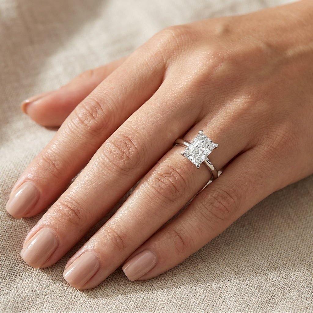 SOL-175RA-0WLD Radiant solitaire engagement ring hand-model
