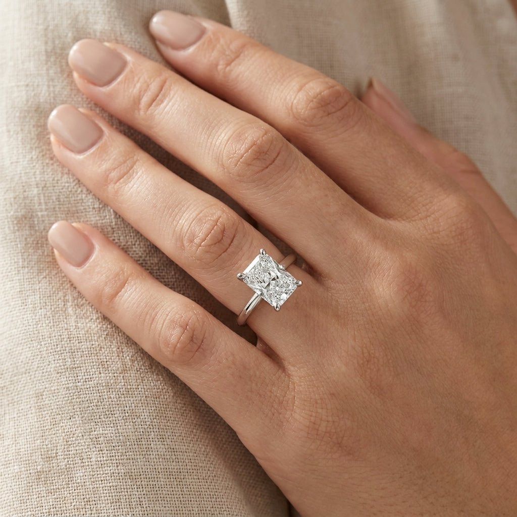SOL-300RA-0WLD Radiant solitaire engagement ring hand-model