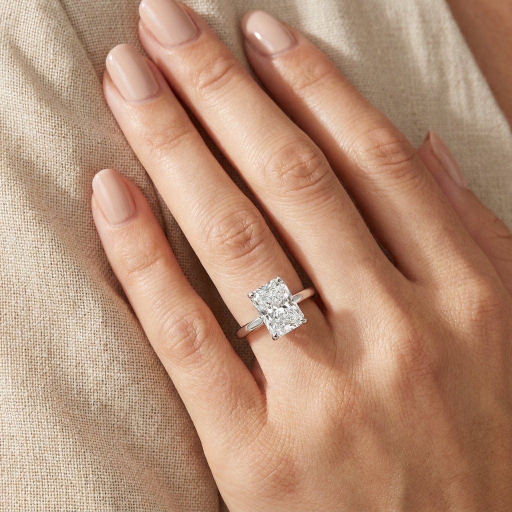 SOL-250RA-0WLD Radiant solitaire engagement ring hand-model