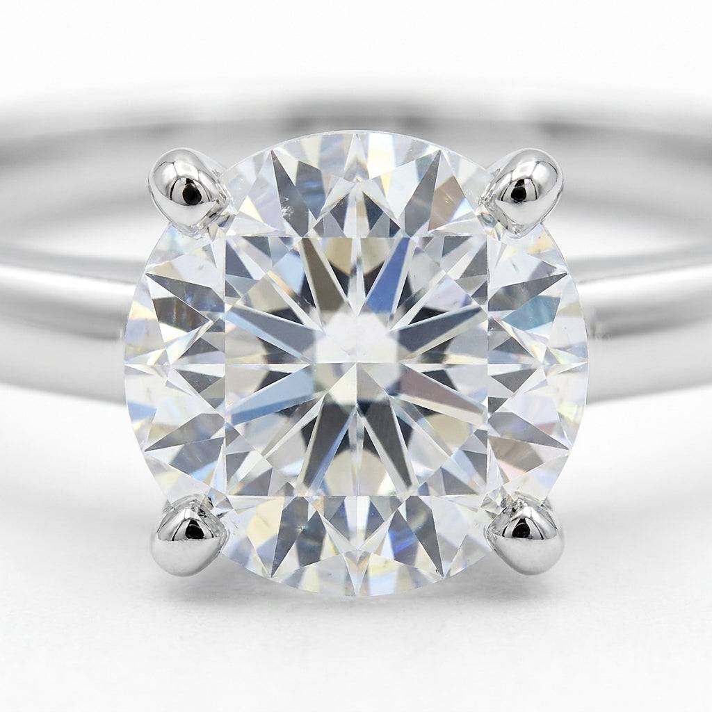 SOL-150R-0WLD Round solitaire engagement ring macro-sparkle