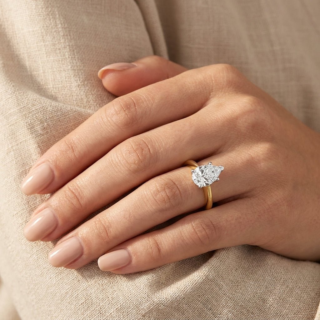 RM12569C-LD Round solitaire engagement ring hand-model