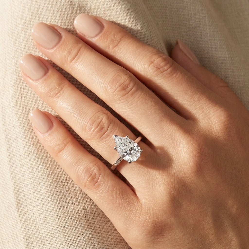RM12607C-WLD Round solitaire engagement ring hand-model