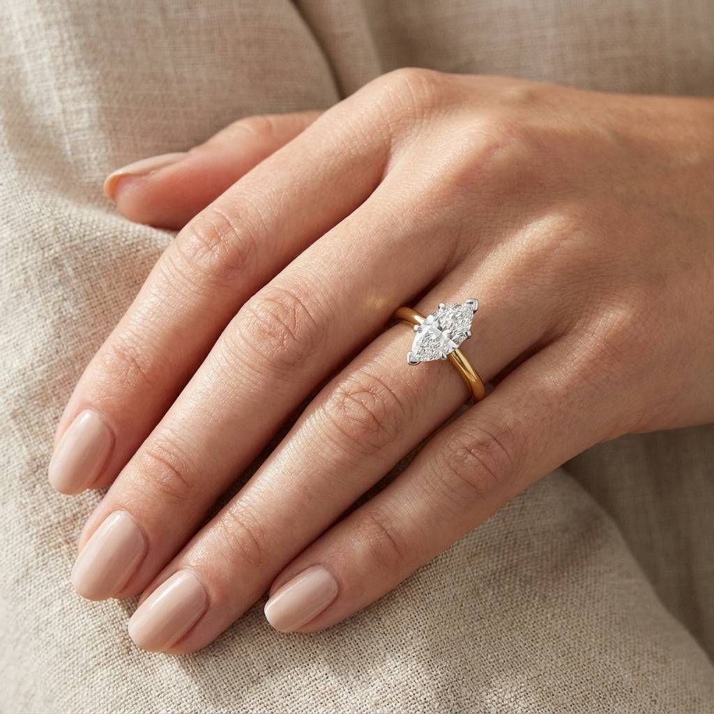 SOL-150MQ-0LD Marquise solitaire engagement ring hand-model