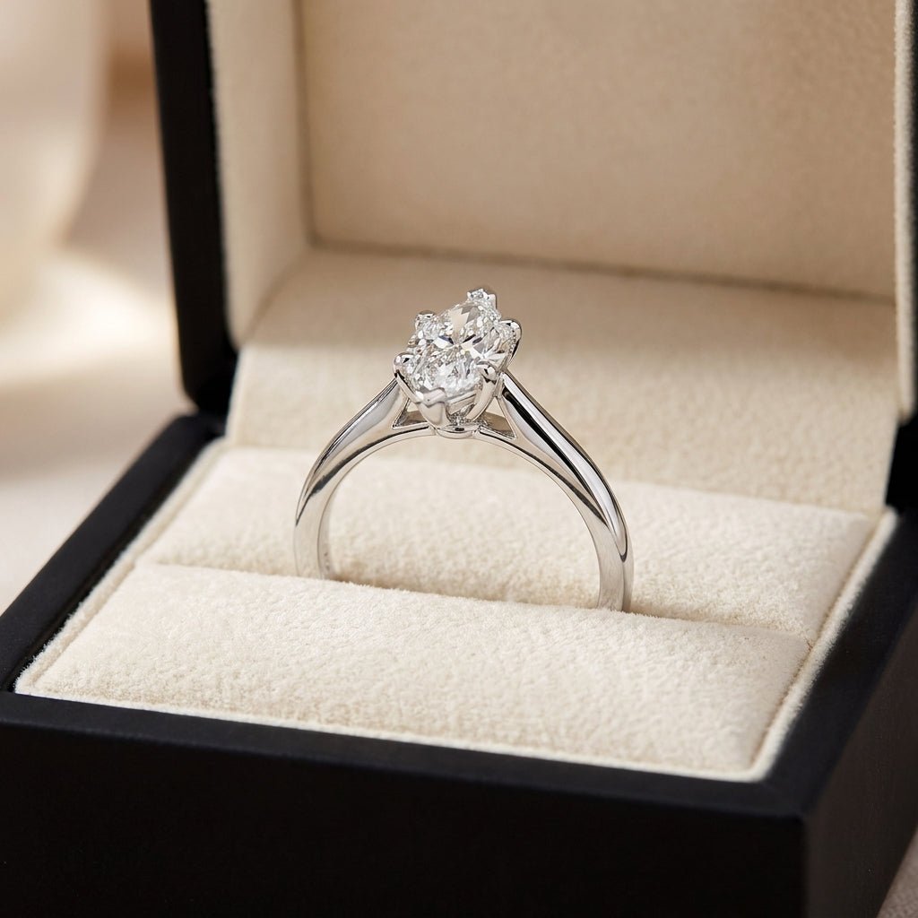 RM12603C-WLD marquise engagement ring in presentation box