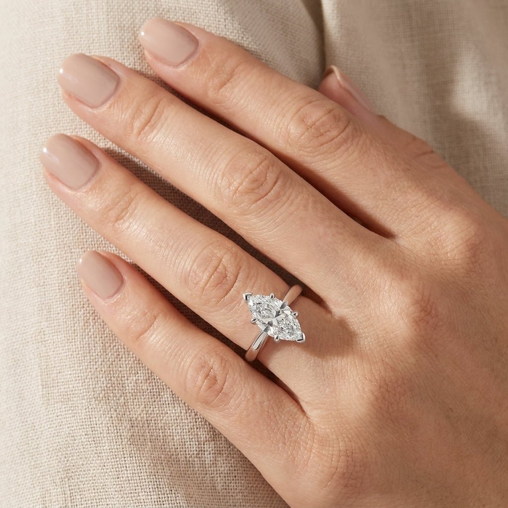 RM12603C-WLD Marquise solitaire engagement ring hand-model
