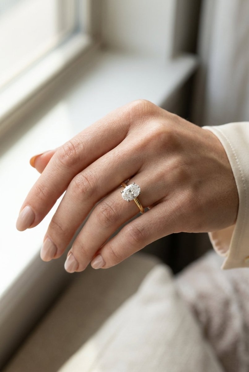 1.5 carat oval lab grown diamond engagement ring - full hand scale