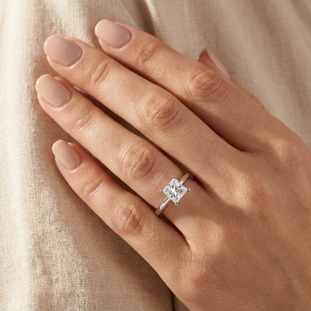 RM12609C-WLD Princess solitaire engagement ring hand-model