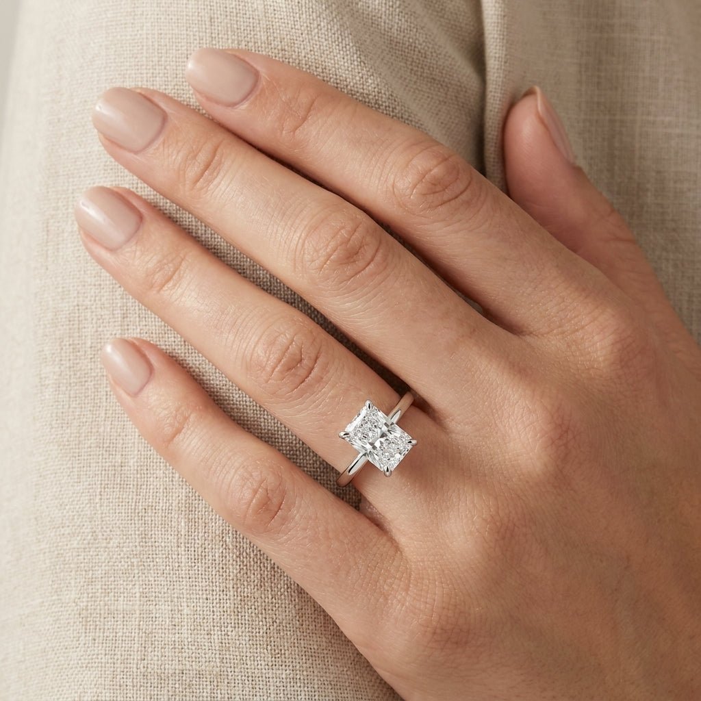RM12612C-WLD Radiant solitaire engagement ring hand-model