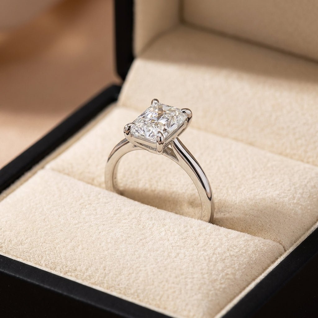 RM12612C-WLD radiant engagement ring in presentation box