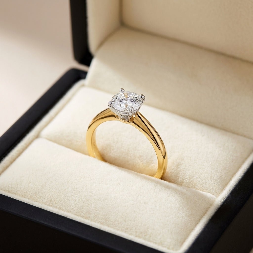 RM12597C-LD round engagement ring in presentation box