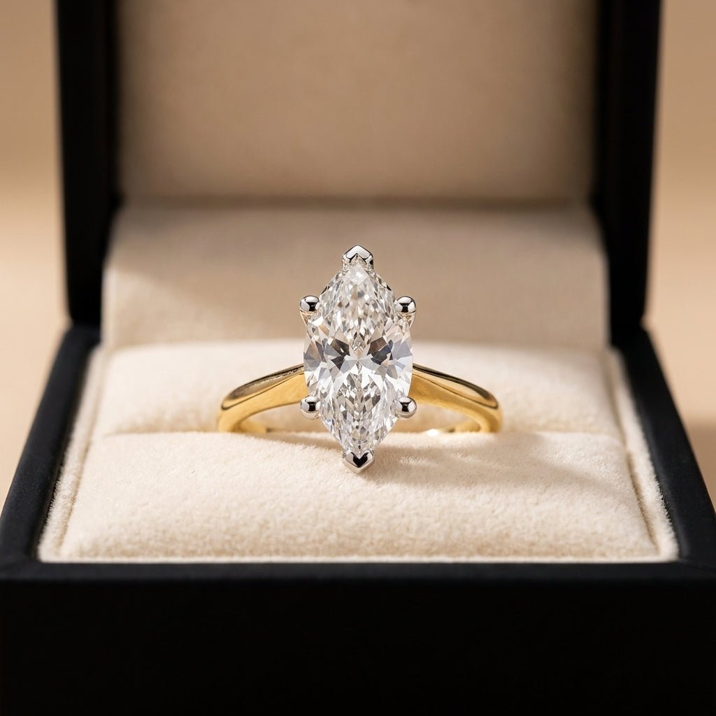 RM12566C-LD marquise engagement ring in presentation box