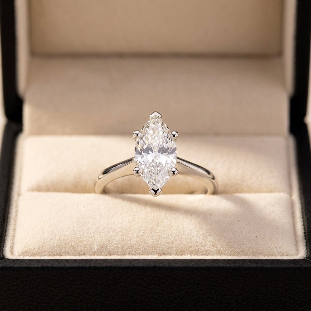 RM12566C-WLD marquise engagement ring in presentation box