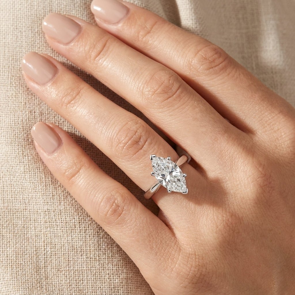 RM12566C-WLD Marquise solitaire engagement ring hand-model