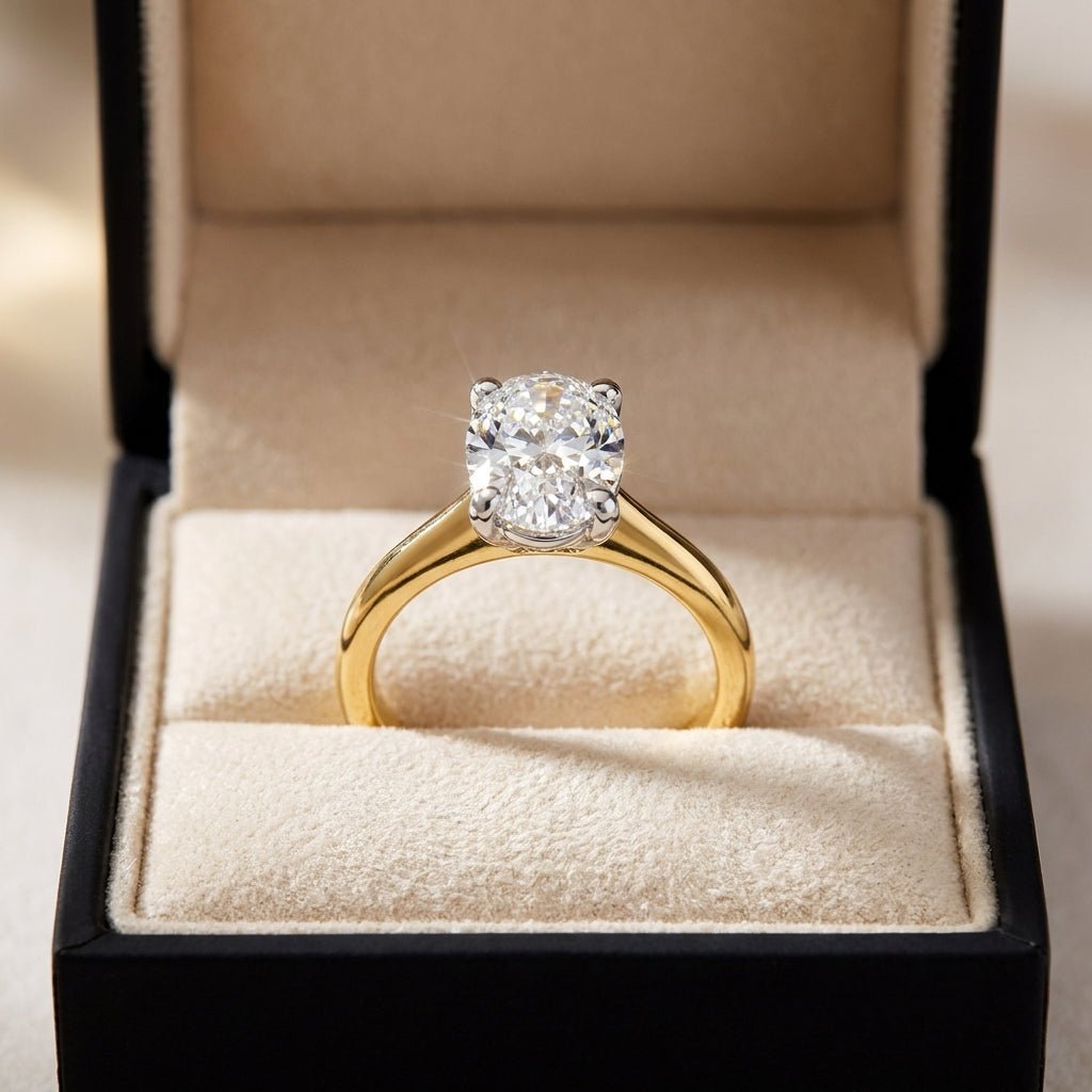 RM12563C-LD oval engagement ring in presentation box