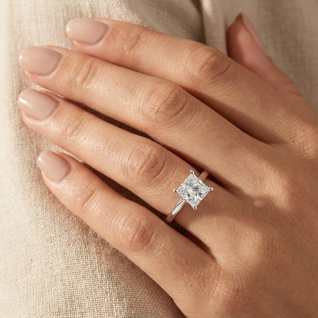 RM12572C-WLD Princess solitaire engagement ring hand-model
