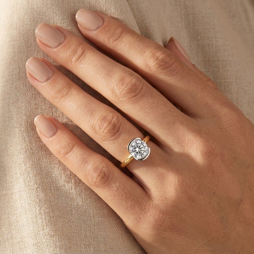 RM12972-200-LD Round half-bezel engagement ring hand-model