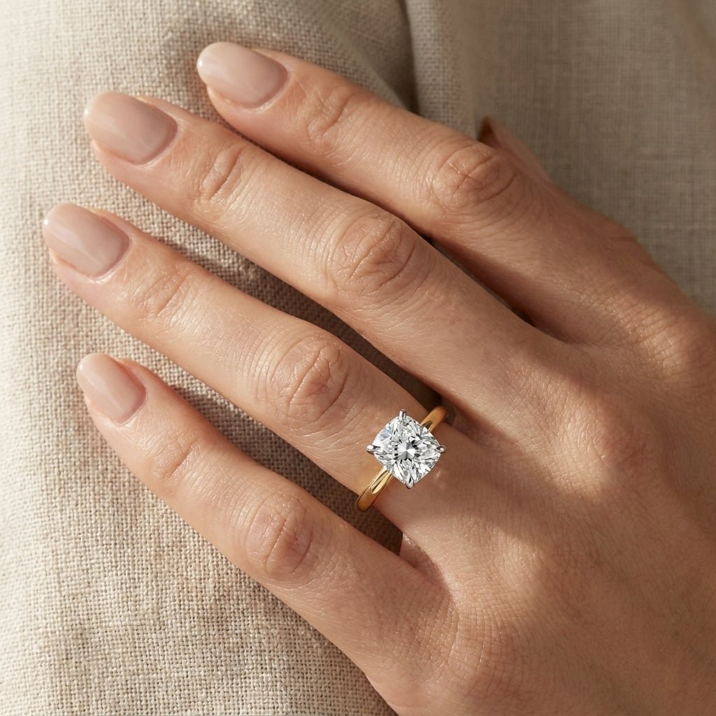 RM12843-250C Cushion solitaire engagement ring hand-model
