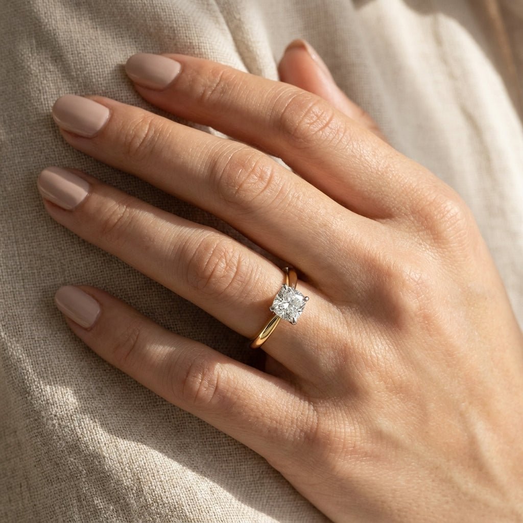 RM12346-250C-WYLD Cushion solitaire engagement ring hand-model