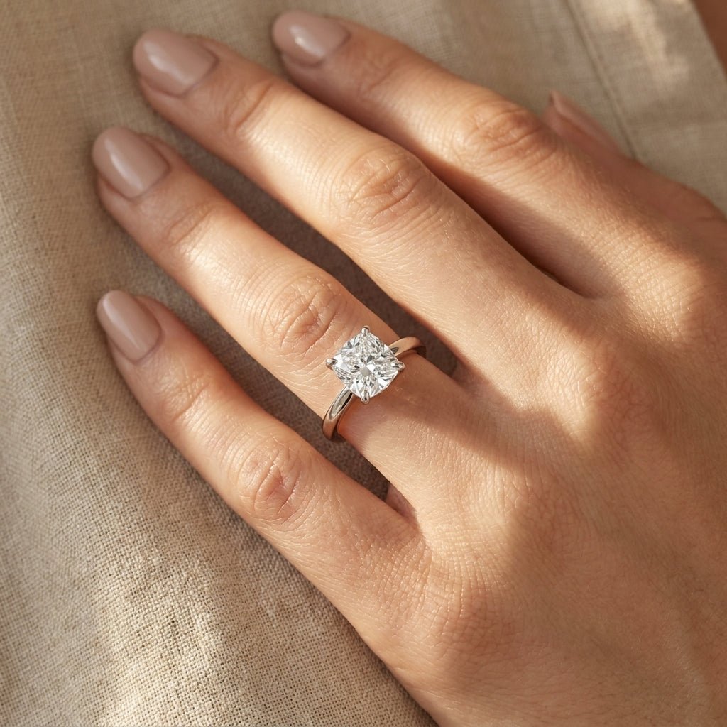 RM12844-250C-WLD Cushion solitaire engagement ring hand-model
