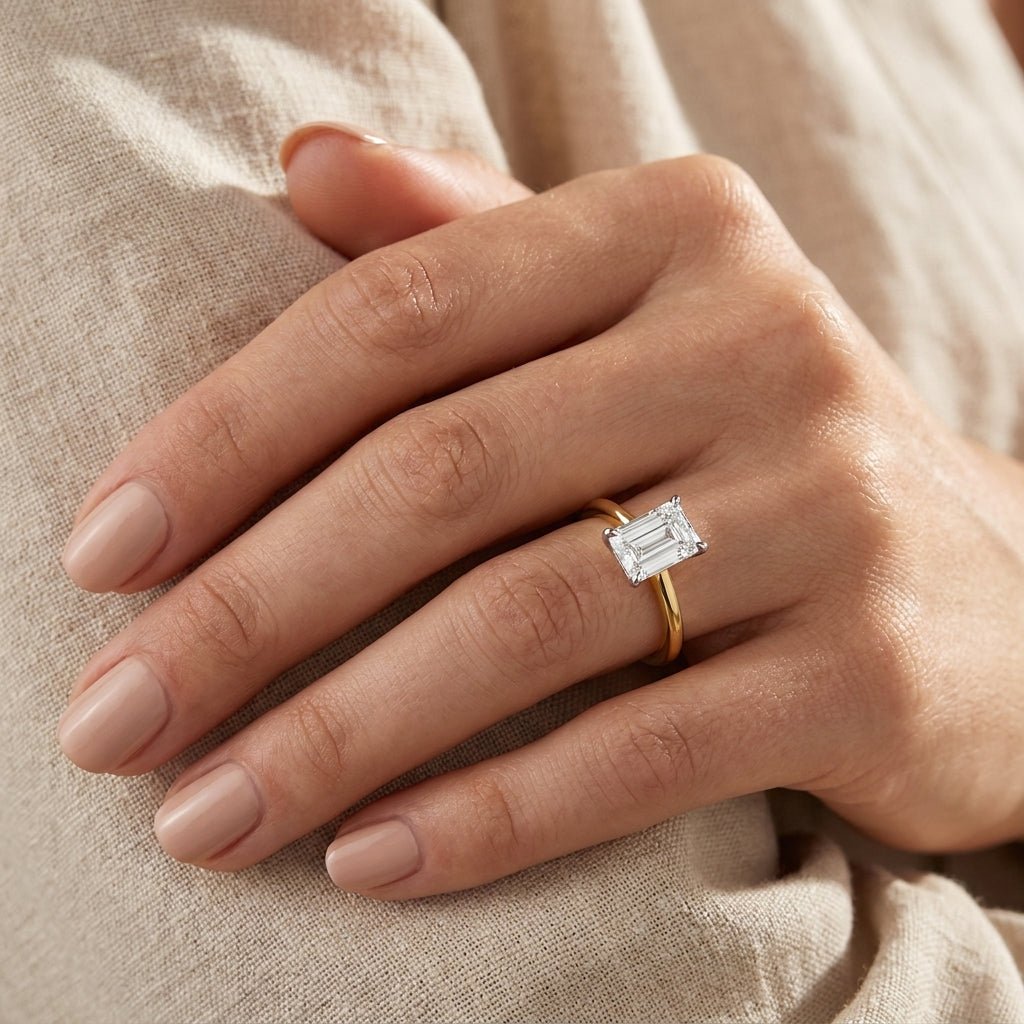 SOL-250EM-0LD Emerald solitaire engagement ring hand-model
