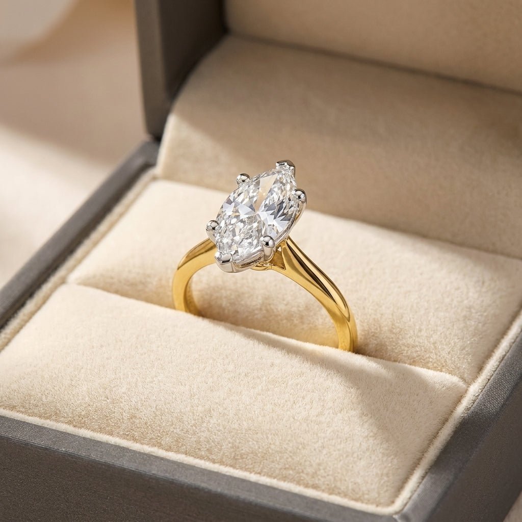 RM12567C-LD marquise engagement ring in presentation box