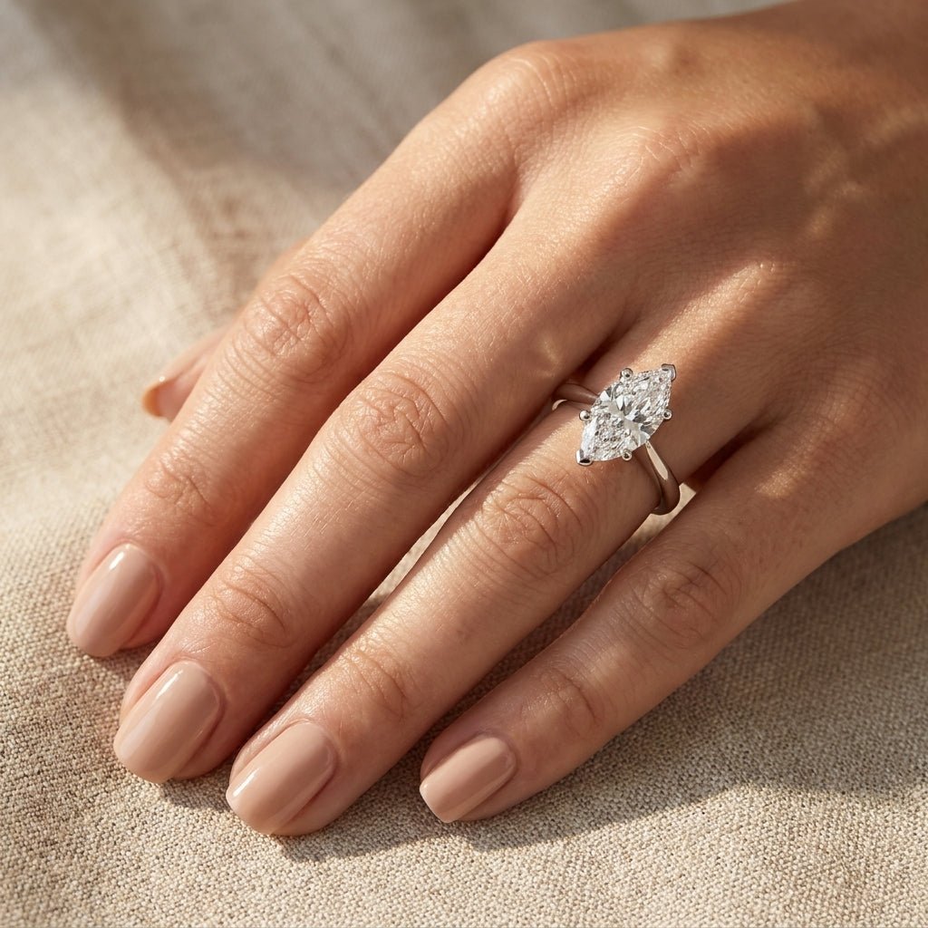 RM12567C-WLD Marquise solitaire engagement ring hand-model