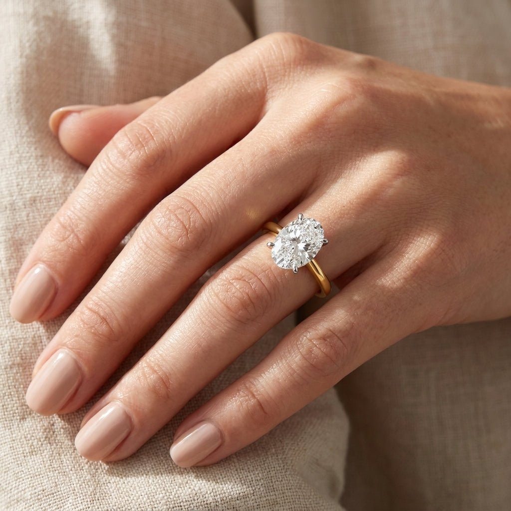 SOL-300O-0LD Oval solitaire engagement ring hand-model