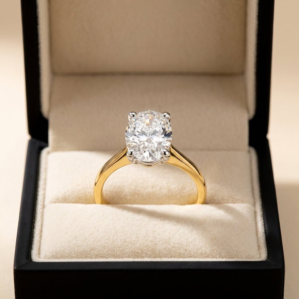 RM12564C-LD oval engagement ring in presentation box