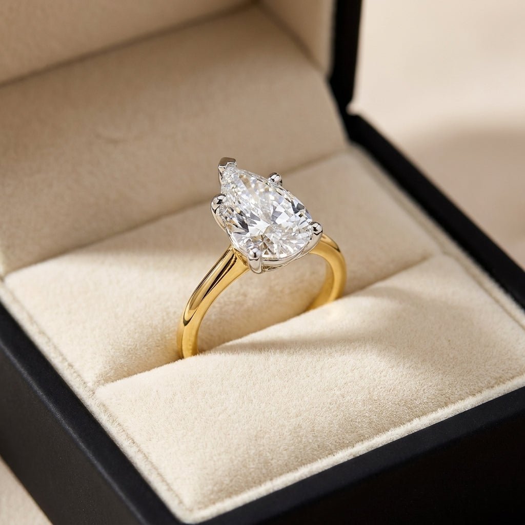 RM12570C-LD pear engagement ring in presentation box