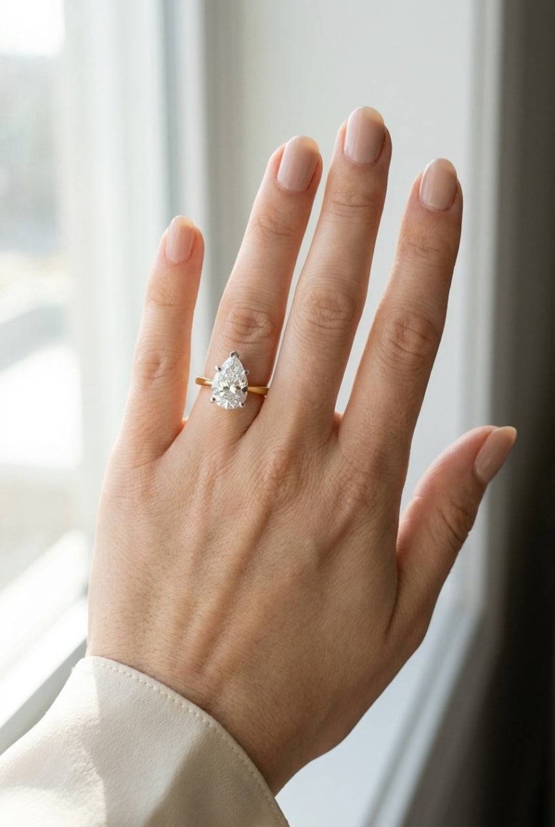 3 carat pear lab grown diamond engagement ring - full hand scale