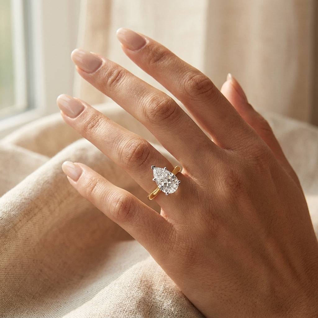 3 carat pear lab grown diamond engagement ring - hand model