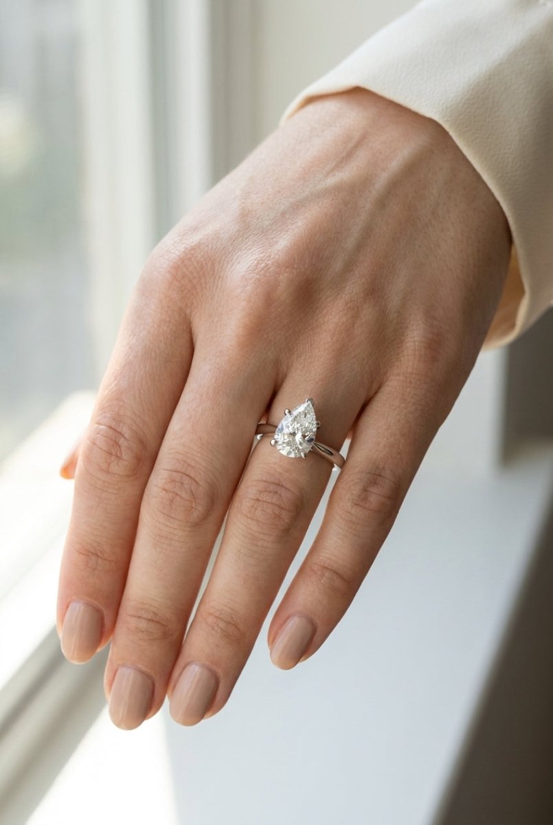 3 carat pear lab grown diamond engagement ring - full hand scale