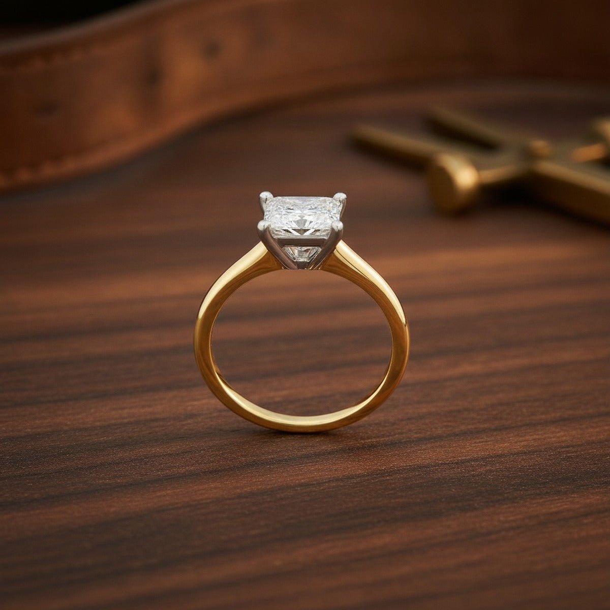 Aydins 3 Carat Princess Lab Grown Diamond Engagement Ring | 10K Two-Tone Gold lifestyle scene, dark walnut workshop