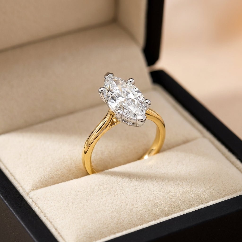 RM12568C-LD marquise engagement ring in presentation box