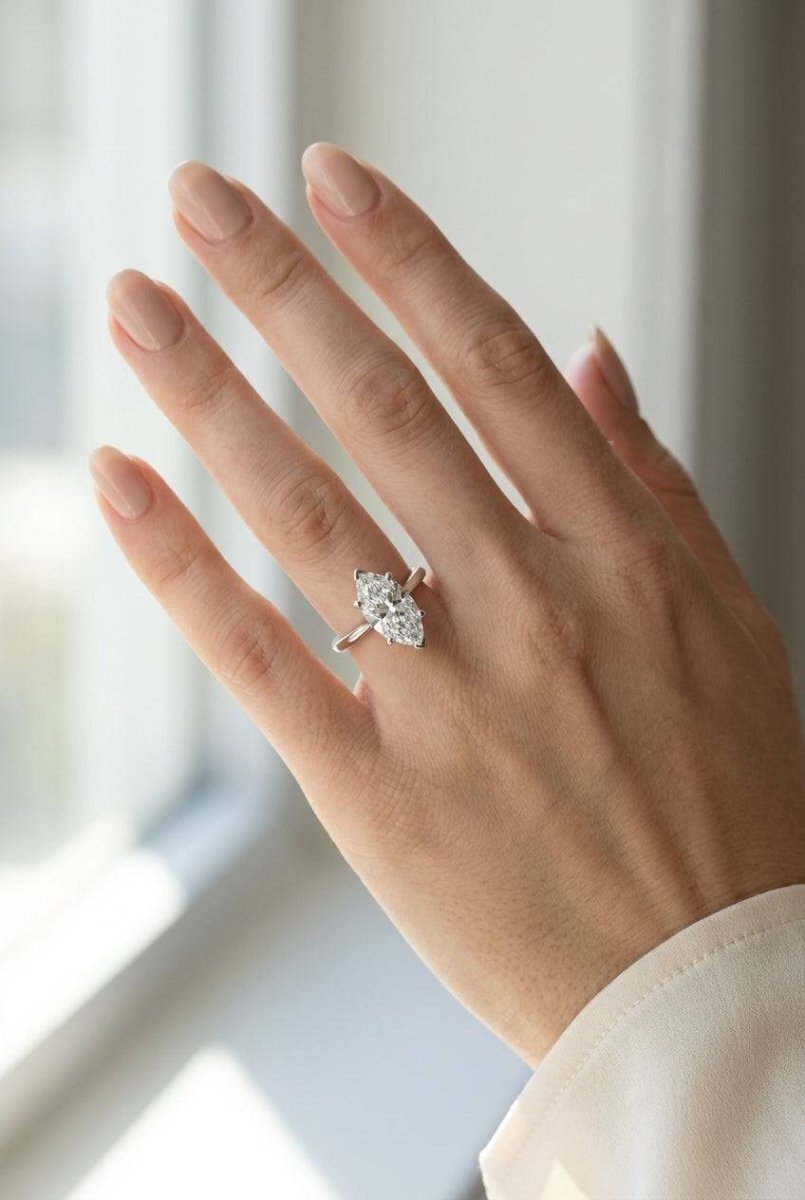 4 carat marquise lab grown diamond engagement ring - full hand scale