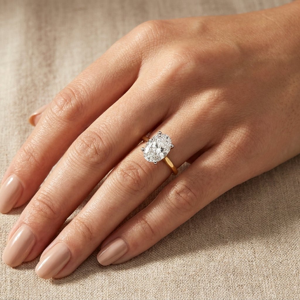 RM12565C-LD Oval solitaire engagement ring hand-model