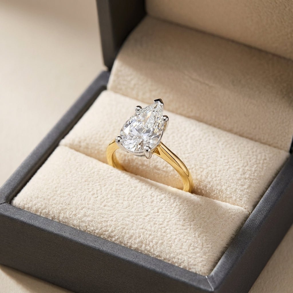 RM12571C-LD pear engagement ring in presentation box